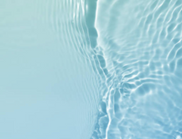 Soft blue water ripple gradient background image used on PupSip homepage to evoke calmness, hydration, and clean wellness aesthetics.